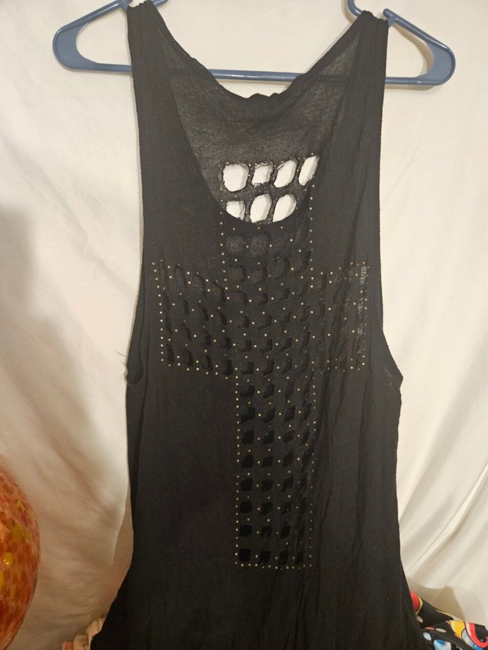 Black Sleeveless Top with Cutout Cross Design